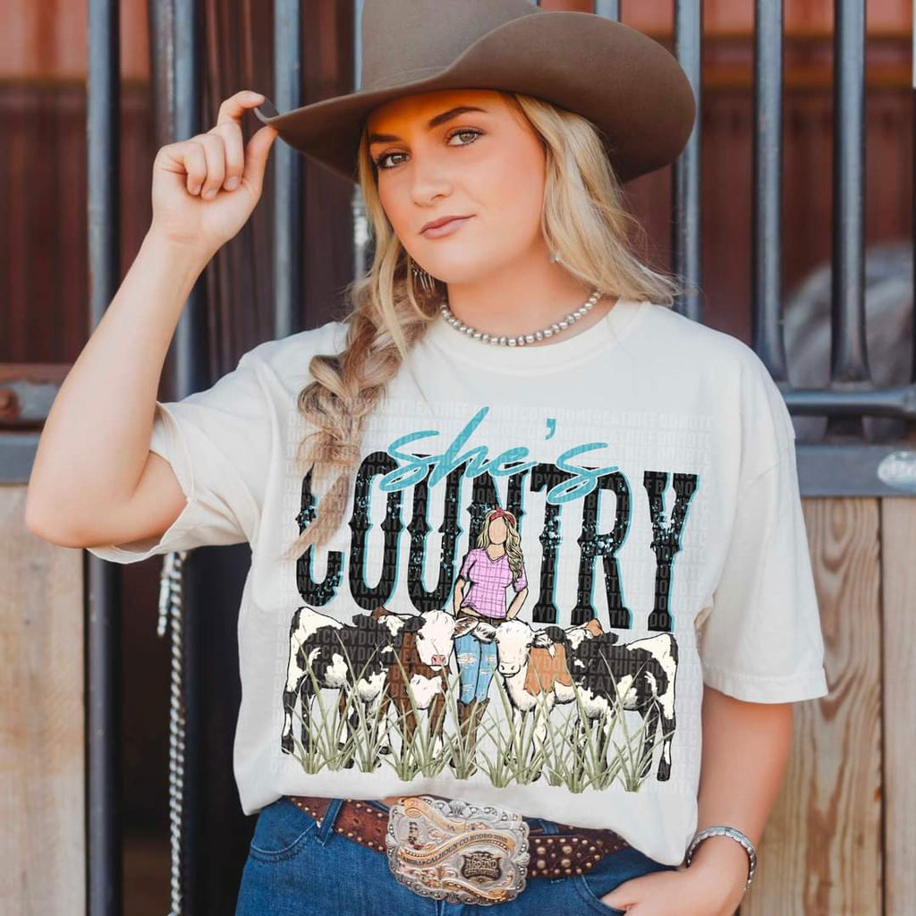 She's country cowgirl with cows